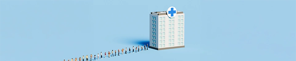 Modellino di edificio Ospedale con persone in coda per entrare
